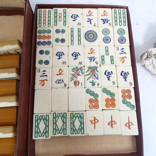 367 - A Chad Valley Mahjong bone and bamboo set, cased with stands