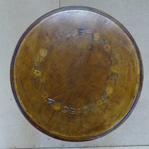 2401 - A Victorian walnut circular topped wine table on tripod base, 51cm x 72cm