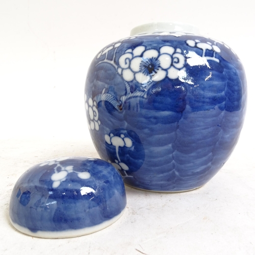 202 - 2 Chinese blue and white Prunus pattern ginger jars, height 14cm