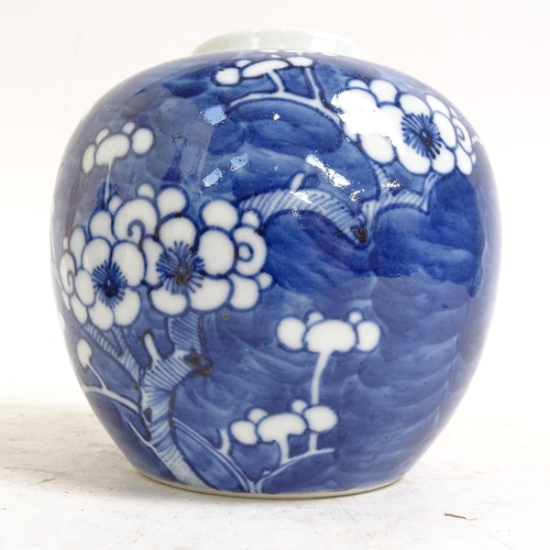 202 - 2 Chinese blue and white Prunus pattern ginger jars, height 14cm