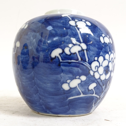 202 - 2 Chinese blue and white Prunus pattern ginger jars, height 14cm