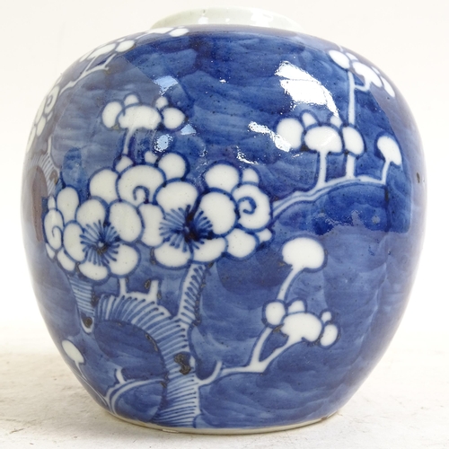 202 - 2 Chinese blue and white Prunus pattern ginger jars, height 14cm