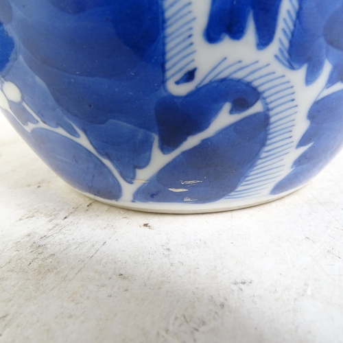 202 - 2 Chinese blue and white Prunus pattern ginger jars, height 14cm