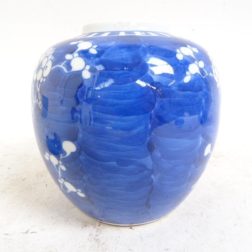 202 - 2 Chinese blue and white Prunus pattern ginger jars, height 14cm