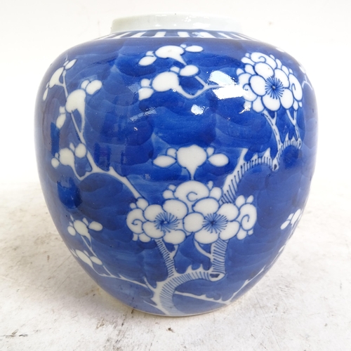 202 - 2 Chinese blue and white Prunus pattern ginger jars, height 14cm