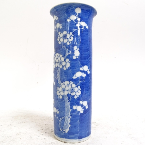 216 - A Chinese blue and white Prunus pattern sleeve vase, height 26cm