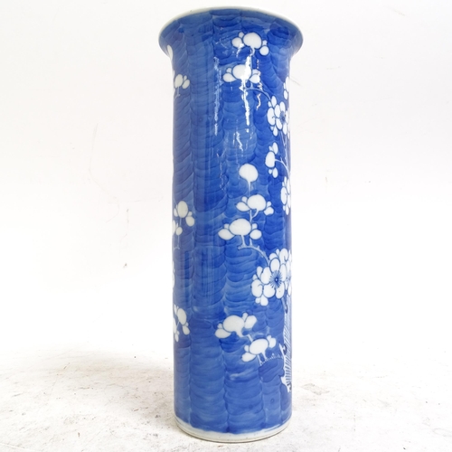 216 - A Chinese blue and white Prunus pattern sleeve vase, height 26cm