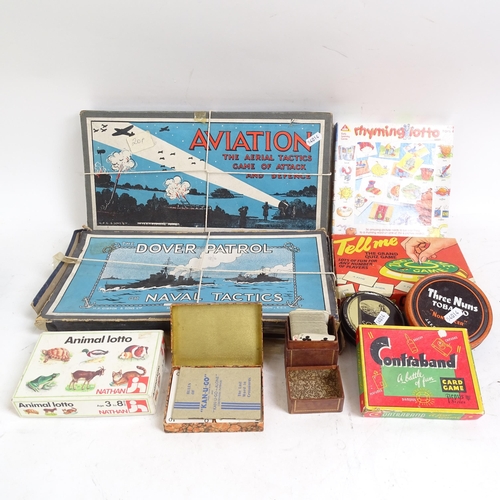 496 - A large selection of Vintage board games, and Vintage advertising tins, including Player's Navy Cut ... 