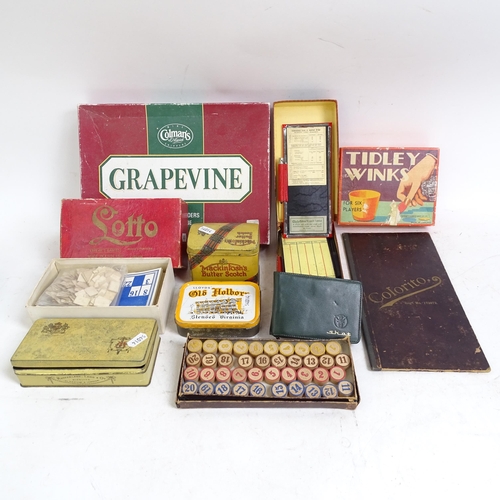 496 - A large selection of Vintage board games, and Vintage advertising tins, including Player's Navy Cut ... 