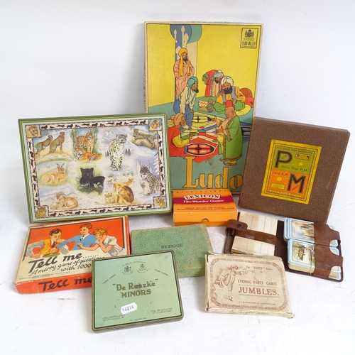 496 - A large selection of Vintage board games, and Vintage advertising tins, including Player's Navy Cut ... 