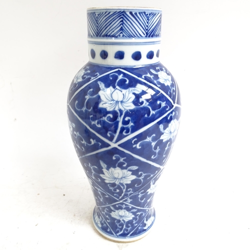 215 - A Chinese blue and white baluster jar and cover, height 34cm