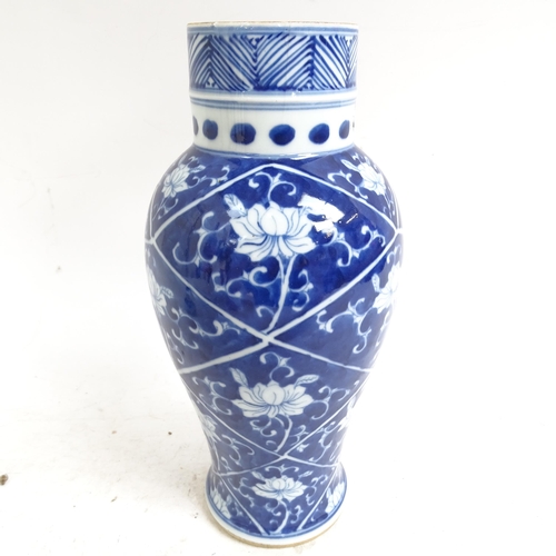 215 - A Chinese blue and white baluster jar and cover, height 34cm