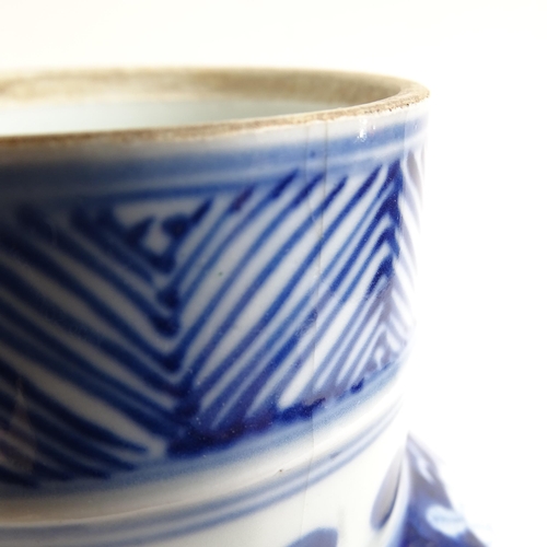 215 - A Chinese blue and white baluster jar and cover, height 34cm