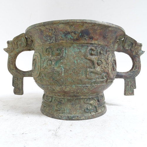 213 - A large Chinese Archaic style patinated bronze incense burner, rim diameter 20cm