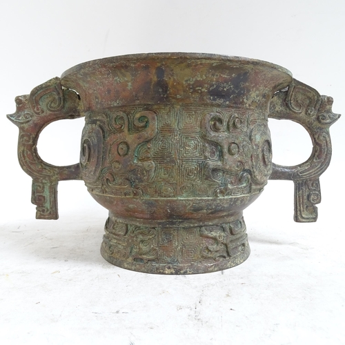 213 - A large Chinese Archaic style patinated bronze incense burner, rim diameter 20cm