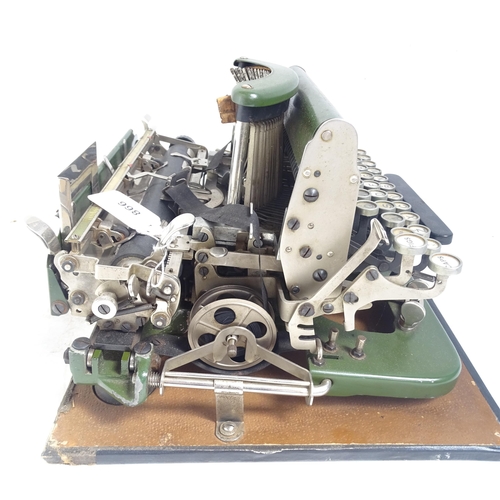 866 - An early 20th century Imperial portable green typewriter, cased