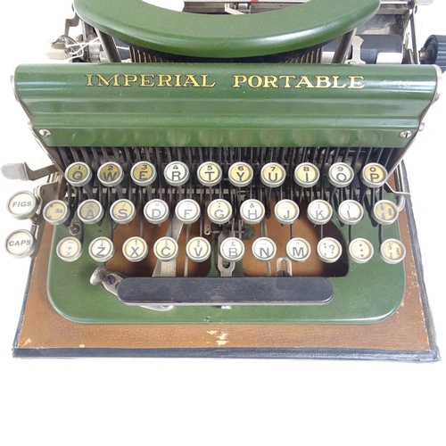 866 - An early 20th century Imperial portable green typewriter, cased