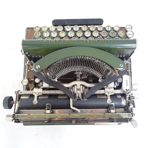 866 - An early 20th century Imperial portable green typewriter, cased