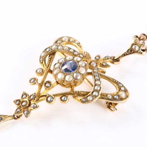 102 - An Edwardian Art Nouveau 9ct gold sapphire and pearl floral pendant necklace/brooch, on 9ct rose gol... 