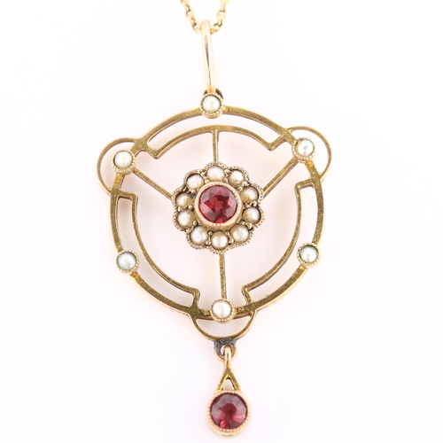 103 - An Edwardian garnet and pearl openwork pendant necklace, unmarked gold settings, on 9ct fine fancy l... 