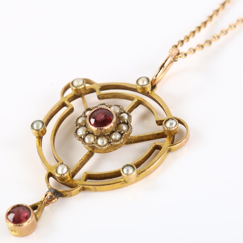 103 - An Edwardian garnet and pearl openwork pendant necklace, unmarked gold settings, on 9ct fine fancy l... 