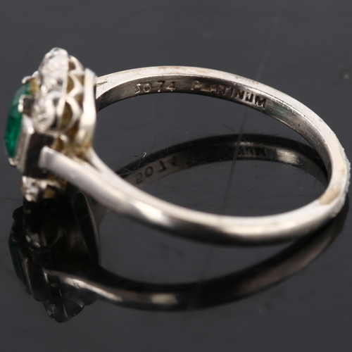 105 - An Art Deco platinum emerald and diamond ring, set with octagonal step-cut emerald, and baguette and... 