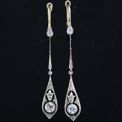 106 - A pair of Art Deco diamond openwork pendant earrings, unmarked gold and platinum settings with old E... 