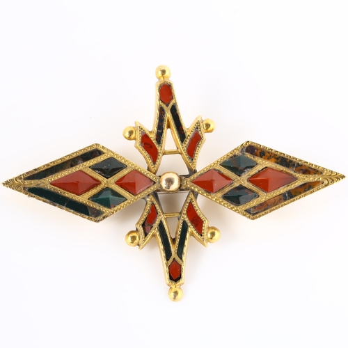 110 - A Scottish hardstone brooch, unmarked yellow metal settings with pyramid and flat-cut bloodstone jas... 