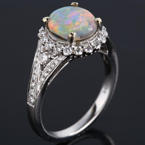 113 - An 18ct white gold lightning ridge opal and diamond cluster ring, set with circular cabochon opal an... 