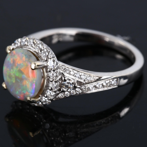 113 - An 18ct white gold lightning ridge opal and diamond cluster ring, set with circular cabochon opal an... 