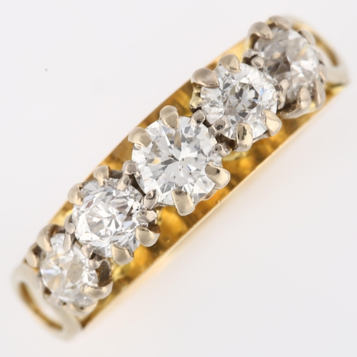 114 - An 18ct gold five stone diamond ring, set with modern round brilliant and old European-cut diamonds,... 