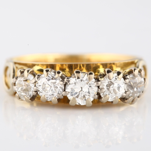 114 - An 18ct gold five stone diamond ring, set with modern round brilliant and old European-cut diamonds,... 