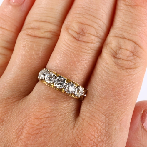 114 - An 18ct gold five stone diamond ring, set with modern round brilliant and old European-cut diamonds,... 