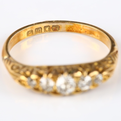 117 - An early 20th century 18ct gold graduated five stone diamond half hoop ring, set with old European-c... 