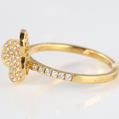 121 - An 18ct gold diamond butterfly dress ring, pave set with modern round brilliant-cut diamonds and dia... 