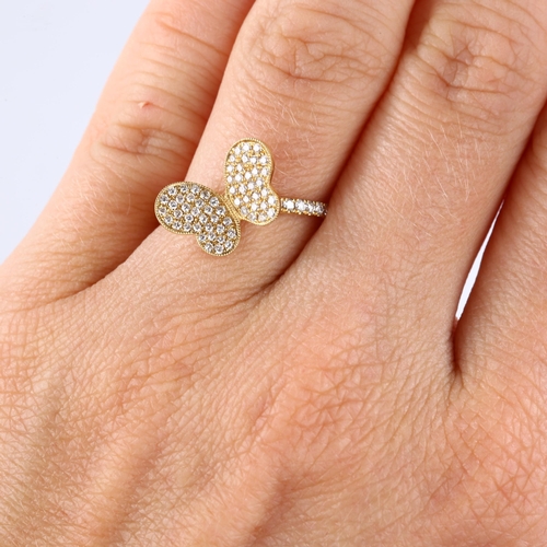 121 - An 18ct gold diamond butterfly dress ring, pave set with modern round brilliant-cut diamonds and dia... 