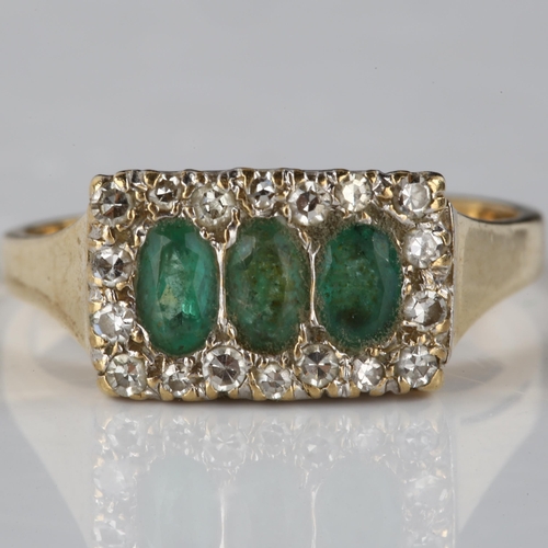 122 - A late 20th century 9ct gold emerald and diamond cluster ring, set with oval mixed-cut emerald and s... 