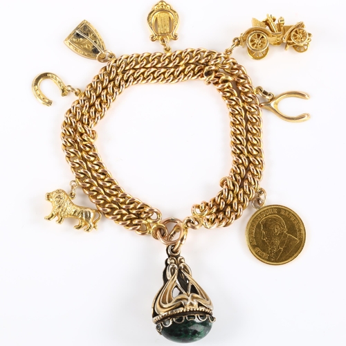 127 - An Antique 9ct gold double curb link charm bracelet, with various 9ct gold charms, including 1895 So... 