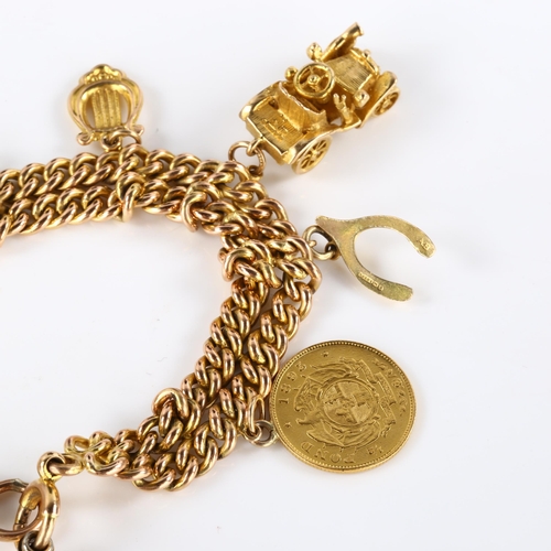 127 - An Antique 9ct gold double curb link charm bracelet, with various 9ct gold charms, including 1895 So... 