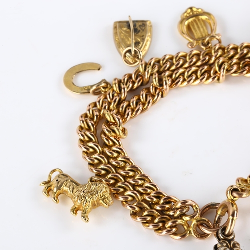 127 - An Antique 9ct gold double curb link charm bracelet, with various 9ct gold charms, including 1895 So... 