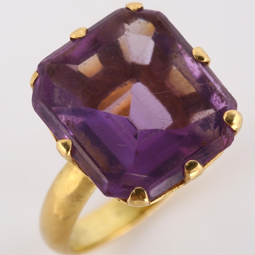 130 - A late 20th century flat-top amethyst seal ring, unmarked yellow metal settings, setting height 17mm... 