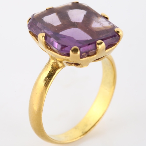 130 - A late 20th century flat-top amethyst seal ring, unmarked yellow metal settings, setting height 17mm... 