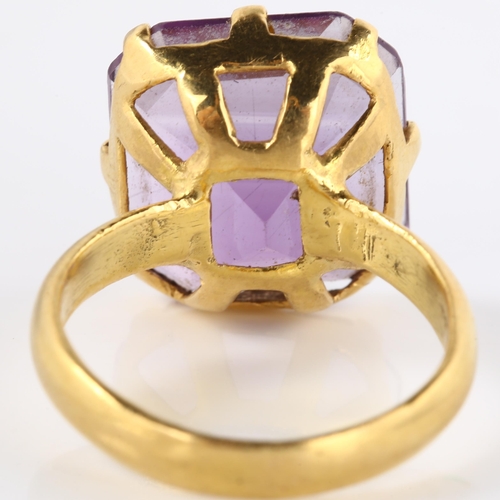 130 - A late 20th century flat-top amethyst seal ring, unmarked yellow metal settings, setting height 17mm... 