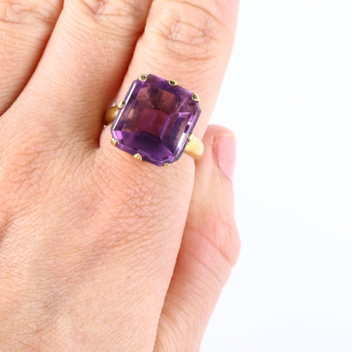 130 - A late 20th century flat-top amethyst seal ring, unmarked yellow metal settings, setting height 17mm... 