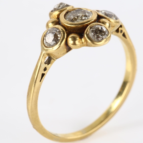 132 - An 18ct gold diamond quatrefoil dress ring, set with old European and old-cut diamonds, total diamon... 