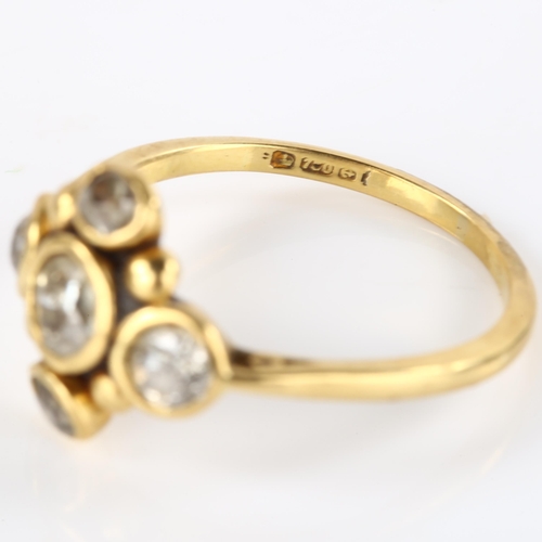 132 - An 18ct gold diamond quatrefoil dress ring, set with old European and old-cut diamonds, total diamon... 