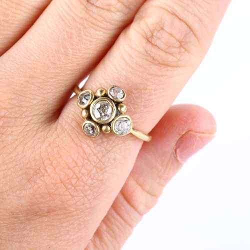 132 - An 18ct gold diamond quatrefoil dress ring, set with old European and old-cut diamonds, total diamon... 