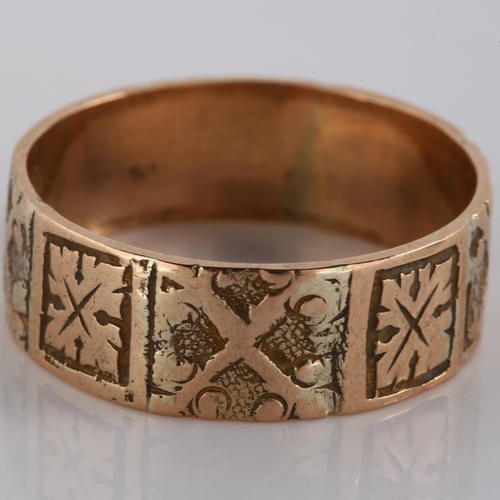 135 - A 19th century 9ct rose gold wedding band ring, with allover engraved decoration, indistinct maker's... 