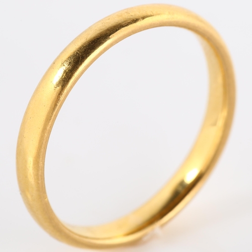 136 - An early 20th century 22ct gold wedding band ring, maker's marks JM, hallmarks Birmingham 1934, band... 