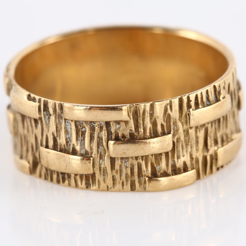 139 - A mid-20th century 9ct gold wedding band ring, textured bark and block design, maker's marks PLS, ha... 